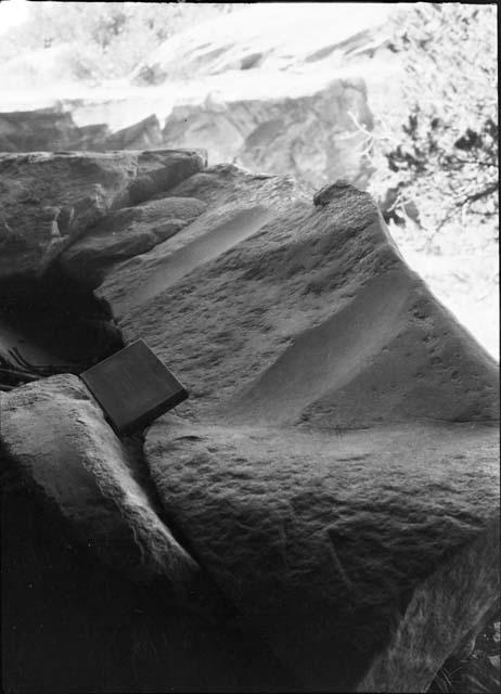 Ax Sharpening Holes in Rock