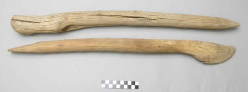 Heavy wooden sticks or crude agricultural tools