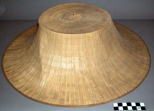 Palm leaf hat - truncated to provide a flat top, curves are concave