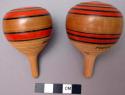 Toy, tops, carved wood, round with tapered base, painted and lacquered red ,blac