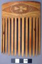 Bamboo comb with incised designs