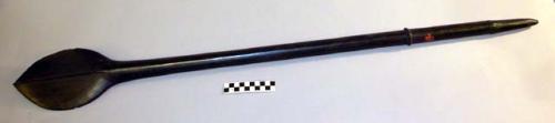 Ebony, paddle shaped club