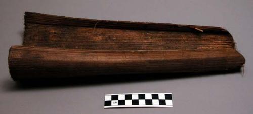 Palm bark "trough," probably used as a dish (contained in basket, no. +