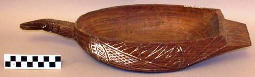 Wood bird-bowl with incised design and white paint rubbed into +