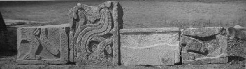 2D7. Sculptured stones from S side of base.