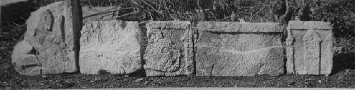 2D7. Sculptured stones from S side of base.