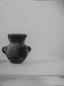 Ceramic pot with handles