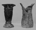 Black-brown vase, pedestal base; Fine red vase.