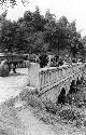 People going across a bridge