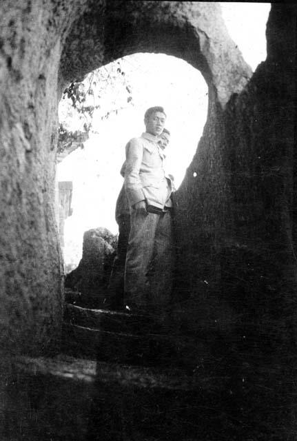 Men standing in archway