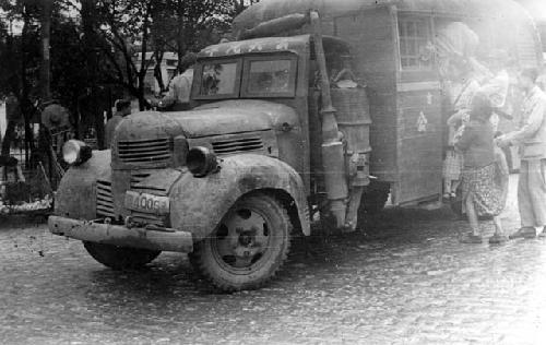 People entering truck