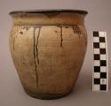 Ceramic vessel with brown glaze