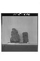 Small stone figure (right profile); frgt of small stone figure (front)