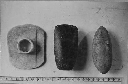 Jade ear plug and two stone artifacts