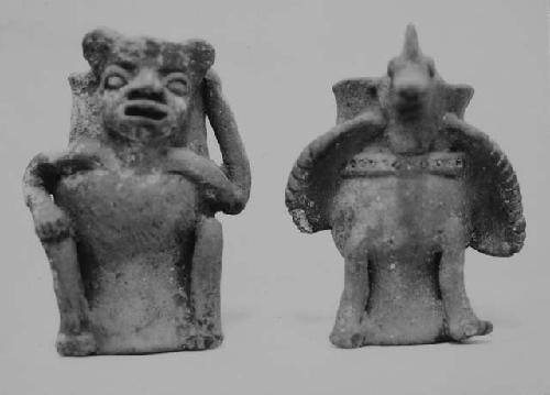 Small pedestal-base effigy vessels (3).