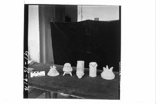 Five Small Vessels of Coarse Red-Brown Pottery