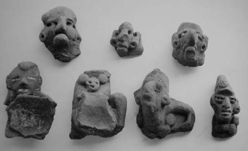 Figurines heads from small bowls (7)