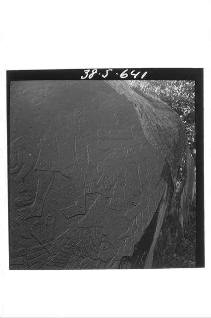 Surface of huge boulder carved in Bas Relief.