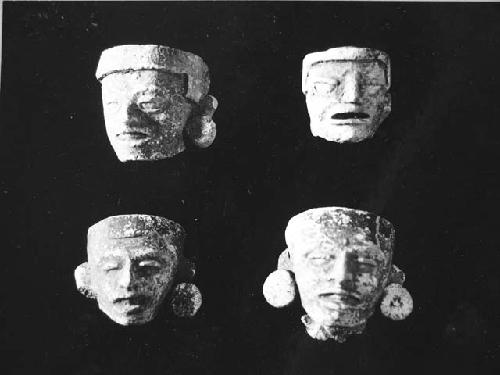 4 small ceramic heads:  a, Lot A-190, Total ht. 5.3 cm., p. 56A-11-40 (top)