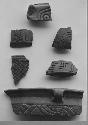 Coarse-incised brown-black sherds (6)