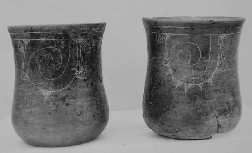 Black-brown fine incised vases (2). For view of left-hand and description, see c