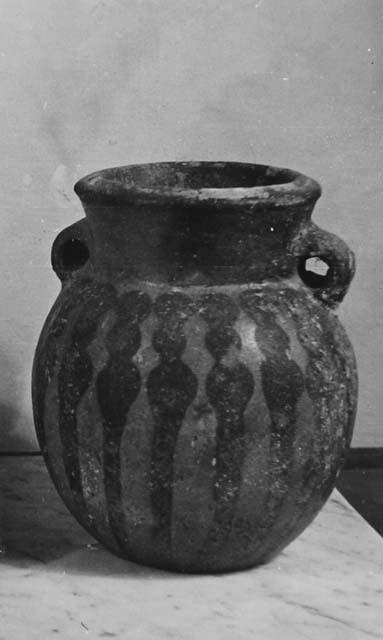 Pottery vessel with handles