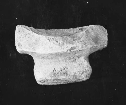 Fragment of grooved three legged metate, Lot A-104