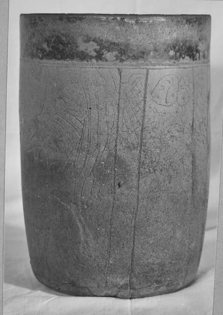 Black ware cylinder- carved & incised decoration