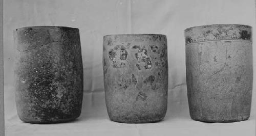 Black ware cylinders.