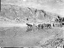 Crossing the Chinle at the rock crossing in a Navajo Wagon