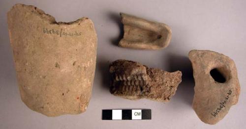 Daubs, clay and pipe fragments?, sherd with preforation, charred wood fragment,