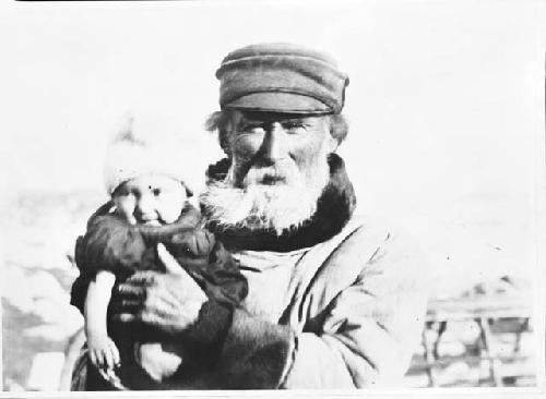 Old Man Holding Baby