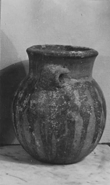 Pottery vessel with handles