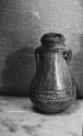 Polished light brown ware decorated with punctate and nail impressed bands