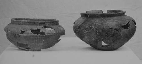 Usulutan and questional Usulutan squat vessels with standing rim.