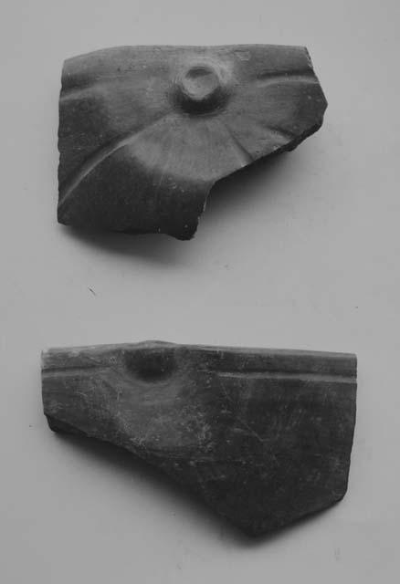 Sherds of red "squash" bowls (2)