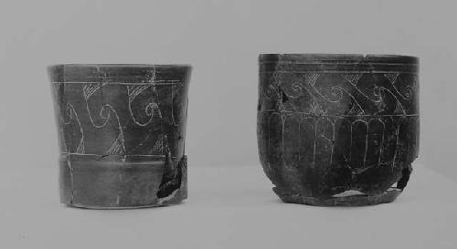 Black-brown fine incised cylinder and goblet (2) For 49-97 see also 49-1-43rt.