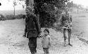 Man walking with little girl