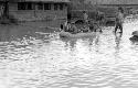 Men paddling a raft