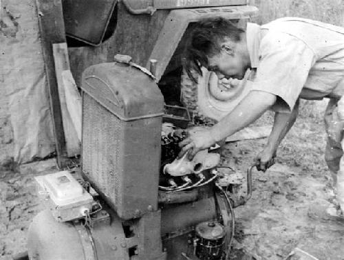 Man working on engine