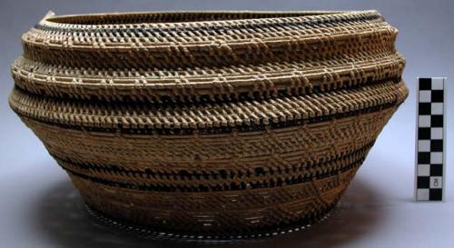 Basket, oval; approx. 25 cm diam. at rim, 30 cm at widest diam., 16 cm. high. Wr