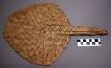 Fan, woven palm leaf, triangular blade, notched top, braided handle