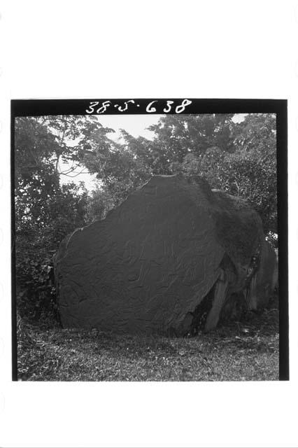 Surface of huge boulder carved in Bas Relief.