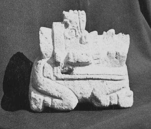 Limestone figure. See 54.15.7 side view