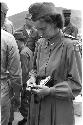 female soldier looking at a watch