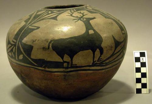 Jar, black exterior design, red base, animal motif