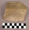 Stone fragment, worked