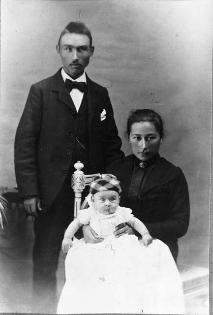Portrait, Couple With Baby