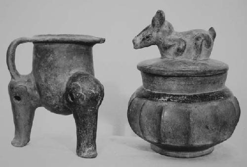 High-leg tripod pitcher and gadrooned vessel with animal cover