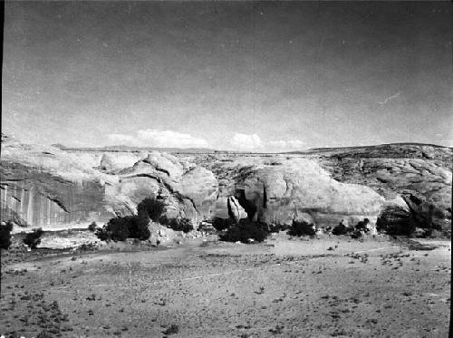 Camp and cliff adjoining cave